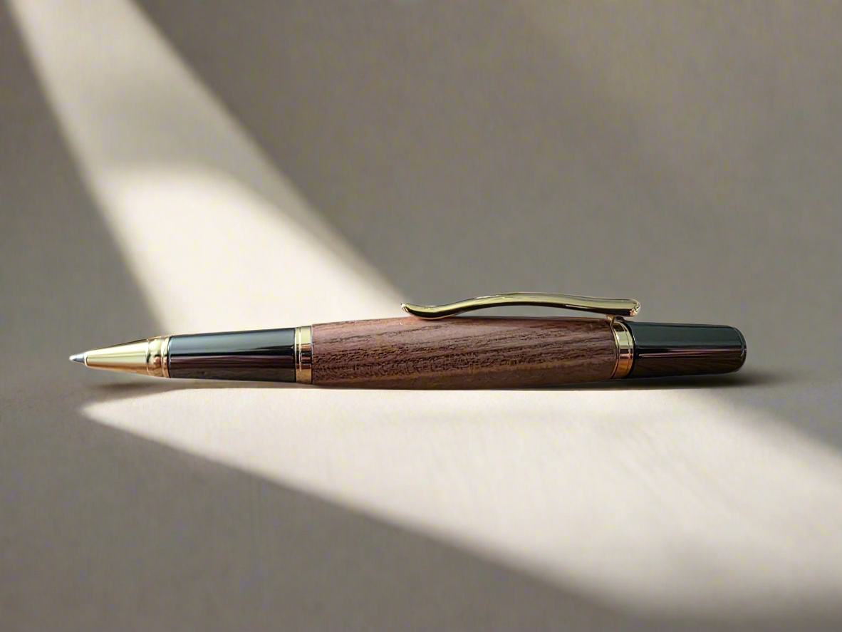 Handcrafted Pistachio Wood Rollerball Pen – Gold & Black Titanium Hardware