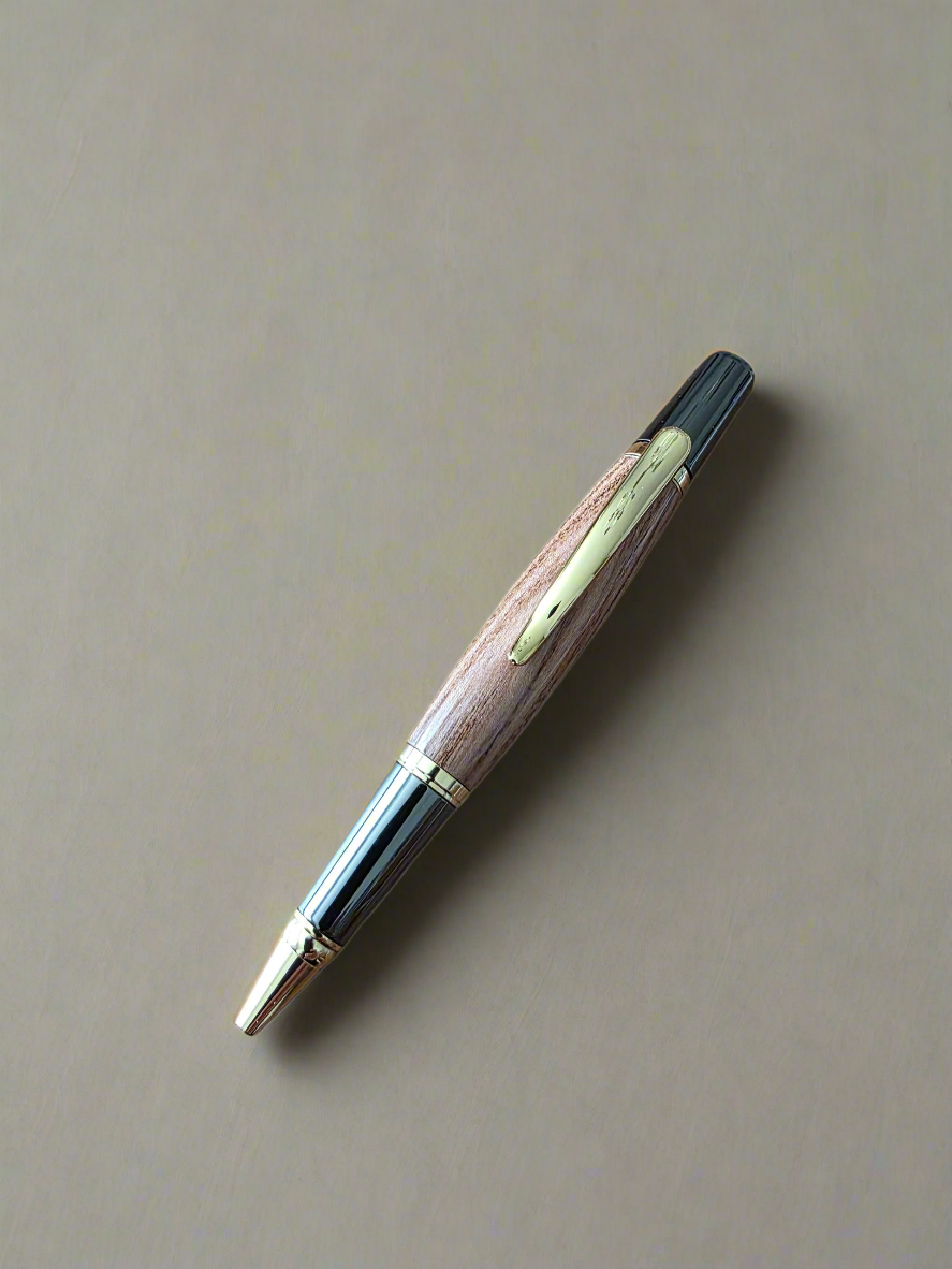 Handcrafted Pistachio Wood Rollerball Pen – Gold & Black Titanium Hardware