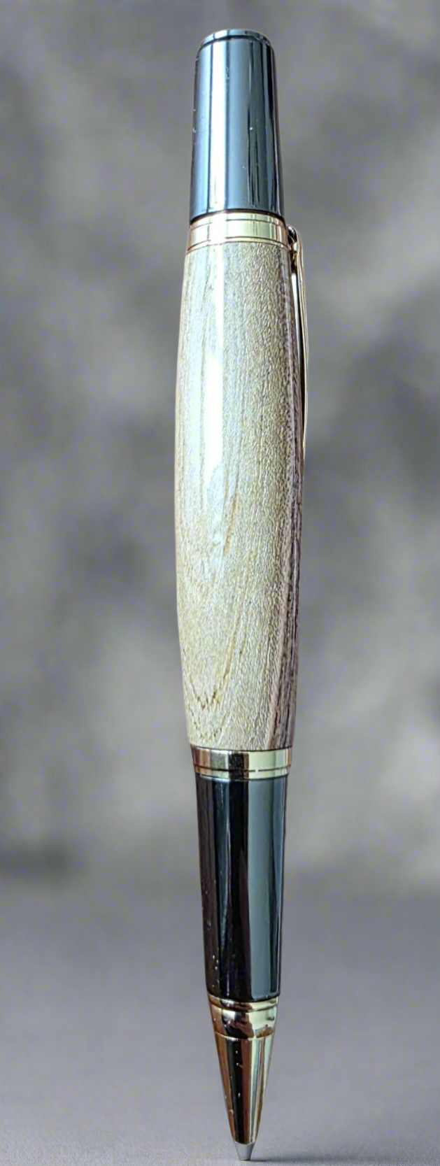 Handcrafted Pistachio Wood Rollerball Pen – Gold & Black Titanium Hardware